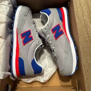 New Balance Gray Sneakers with Blue and Red Accents
